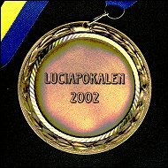 Medaljen de deltagare som ej placerade sig p Luciapokalen 2002 fick.